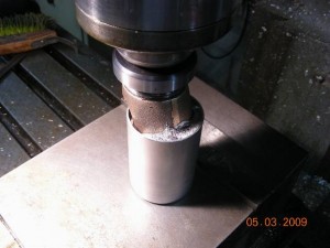 Fixturing metal poured around casting