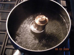 Fixture in boiling water - metal melts at 180 F