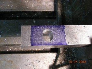 Oblong hole milled into block