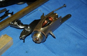 Receiver rear - striker pin with linkage to striker lever visible